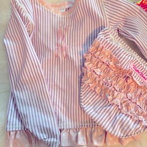 Rufflebutts Lavender Seersucker ruffle rash guard 2 piece